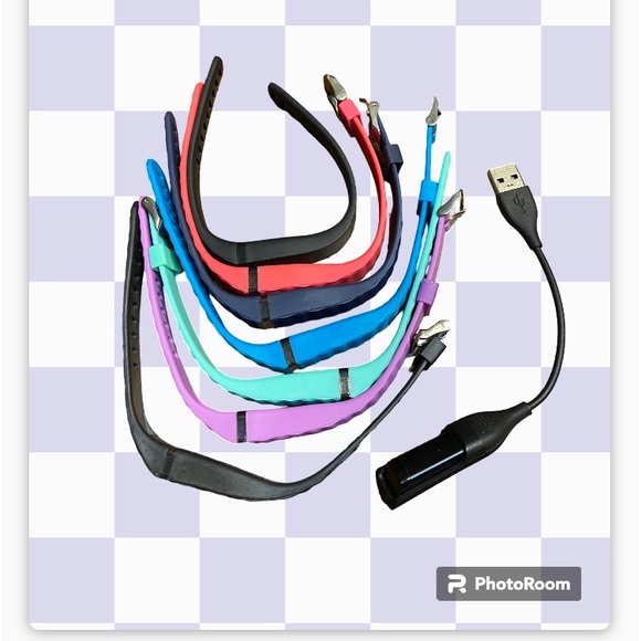 Silicone replacement bands for Fitbit.  And charger. - Picture 2 of 9